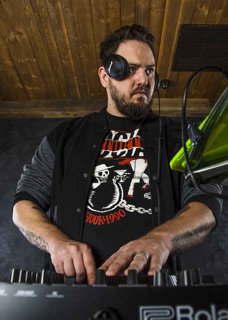 Bear Cole playing a keyboard in the studio